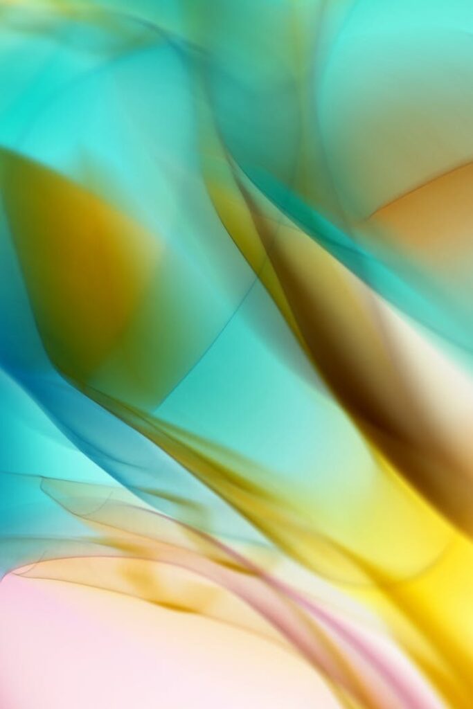 Colorful abstract image with smooth gradient waves creating a dynamic and vibrant look.
